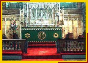 High Altar with reredos which depicts Christ feeding the 5000