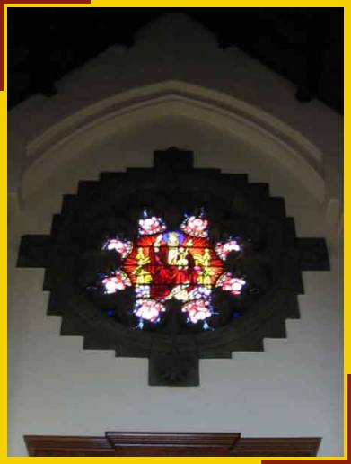 East rose window depicting Christ the King